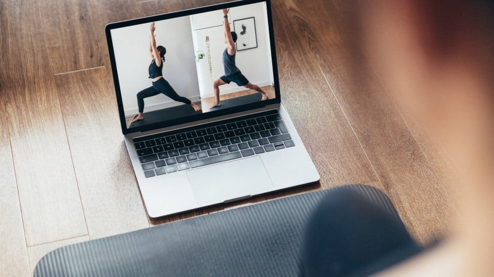 online yoga class on laptop